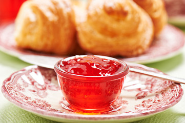 Quince-cranberry jelly in little glass bowl for breakfast