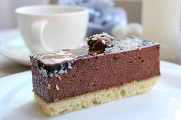 Yummy chocolate cake served on table, close-up