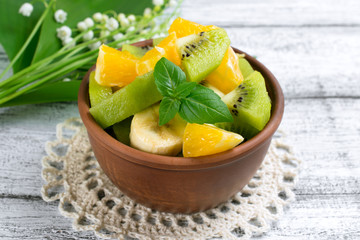 Fruit salad with kiwi, banana and orange