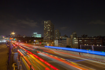 Fototapeta na wymiar Brooklyn Bridge and with traffic trails 