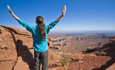 woman enjoying the big view of desert landscape