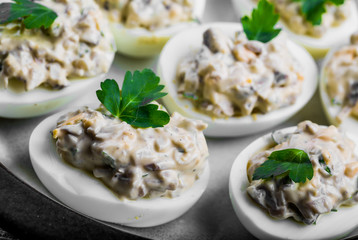 Deviled eggs with mushrooms and mayonnaise
