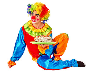 Clown man keeps cake on birthday . Isolated.