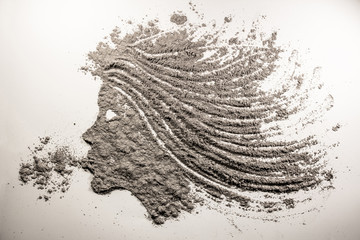 Young girl silhouette head with wind in her hair