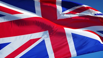 Great britain flag waving in slow motion against blue sky, seamlessly looped, close up, isolated on alpha channel with black and white luminance matte, perfect for film, news, digital composition