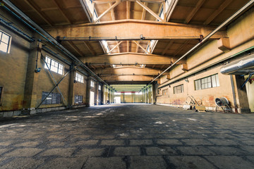 abandoned old industrial factory building in dark colors