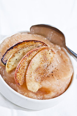 caramelized apple slices on bowl of apple sauce
