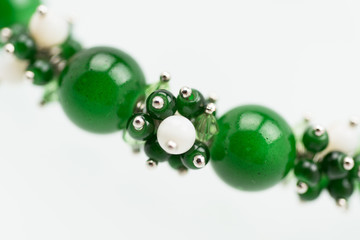 Natural mineral women necklace. Beauty and fashion background with partly defocused different color beads.