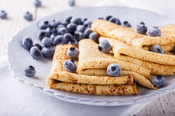 Pancakes with fresh blueberries.selective focus.