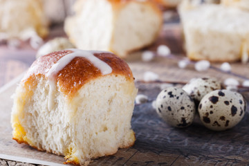 Easter Hot Cross Buns on wooden background.selective focus.