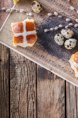 Easter Hot Cross Buns on wooden background.selective focus.