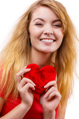 Woman blonde girl holding red heart love symbol