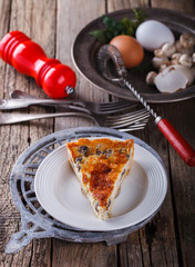 Pie quiche with mushrooms.selective focus.