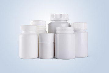 Blank white plastic medicine bottles isolated  with clipping path