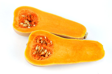 butternut squash cut in halves isolated on white background
