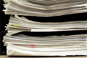close up of stacking documents on office table