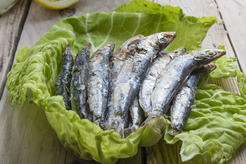 fried sardines on the plate