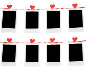 8 Blank instant photo and red clip paper heart hanging on the clothesline with white...