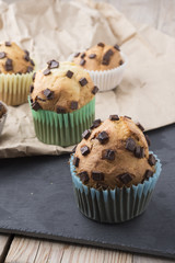muffins with chocolate on a stone tray