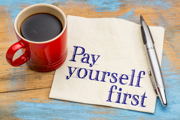 pay yourself first - text on napkin - obrazy, fototapety, plakaty