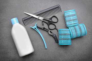 Barber set with tools and cosmetic on grey background