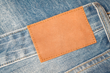 Denim texture  with leather label tag for background
