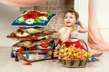 Girl. fireplace. pillows