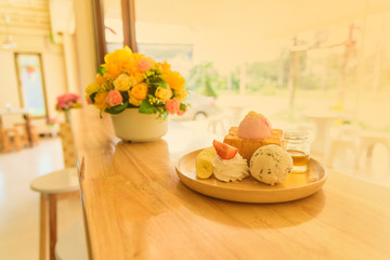 Honey toast on wooden table. Vintage tone.