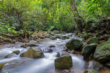 Naklejka na ściany i meble Waterfall in deep rain forest jungle (Krok E Dok Waterfall Sarab