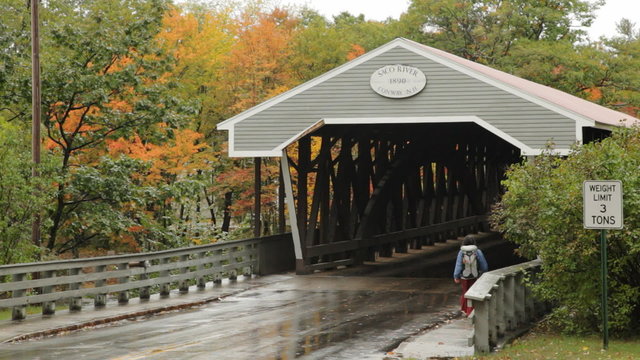 The Saco River covered bridge, built in 1890, on Conway, New Hampshire on a damp Autumn day.