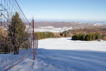 ski trail in the mountains among the trees