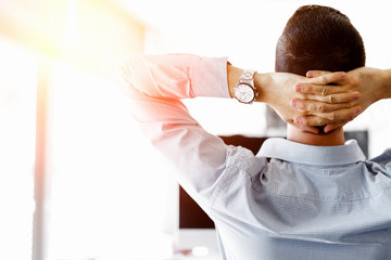 Attractive office worker sitting at desk