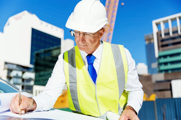 Engineer builder at construction site