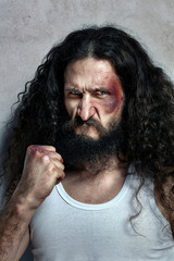 Portrait of a funny wounded fighter