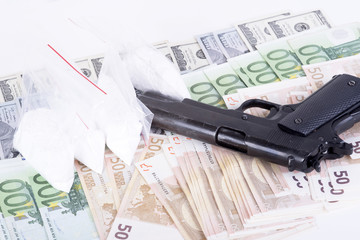 drugs,money,cocaine and gun