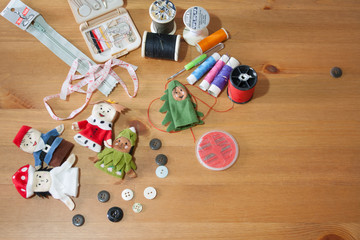 Handmade Christmas doll finger for Christmas gift on wood backgr