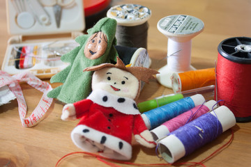 Handmade Christmas doll finger for Christmas gift on wood backgr