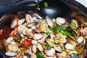 fried  sea shell with sweet basil and curry