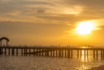 Fototapeta na wymiar Beautiful sunset seascape on a bridge