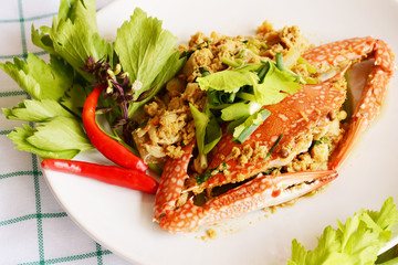 sea crab fried with yellow curry and celery