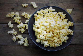 popcorn in the back bowl on wooden