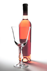Rose wine and wine glass, studio isolated