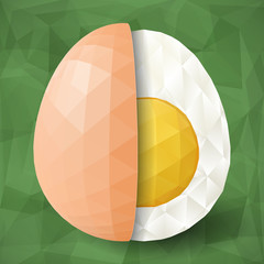 Abstract egg with polygonal surface on green background. Half of boiled egg and eggshell
