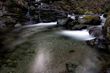 stream of mountain river among stones