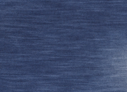 Dark blue denim textile texture.