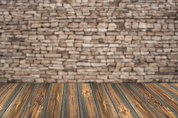 Empty top wooden table and natural stone wall background. For pr