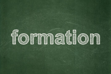 Fototapeta premium Education concept: Formation on chalkboard background