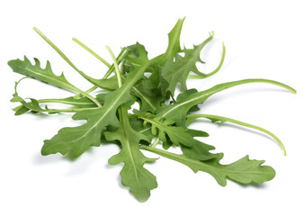Fresh arugula, high angle view. Arugula or rocket leaves, isolated on white background.