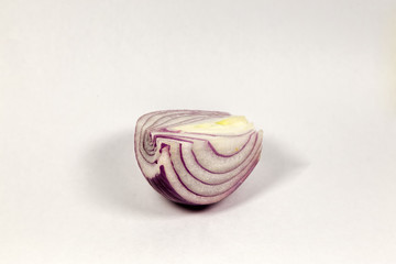 Slice peeled purple onion