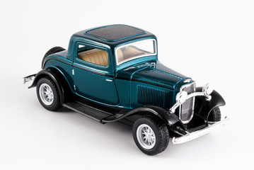 Antique Model Cars Toy, Dark Green toy car model isolated on white background.